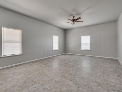 Unfurnished room featuring ceiling fan and a healt