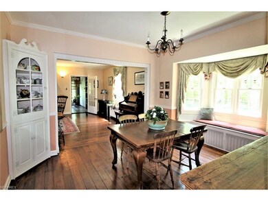 Formal Dining Room with Hardwood Floor, Built-In C