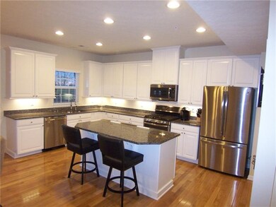 Upgraded kitchen with under cabinet lighting & gra