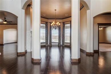 Entry looking to formal dining. Left is office, li