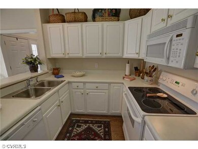 Kitchen - An abundance of cabinetry with double st
