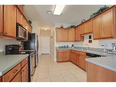 Kitchen. The kitchen features lots of cabinet, cou
