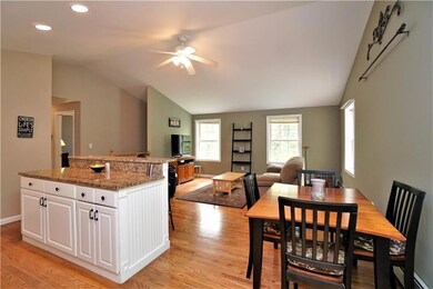 Open floor plan, soaring ceilings,...