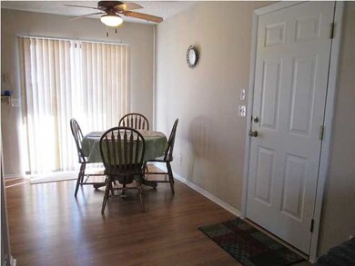 Main floor has wood laminate flooring throughout a