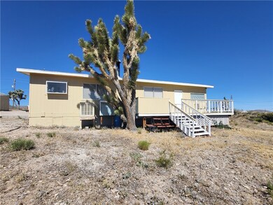 Back of property featuring a deck