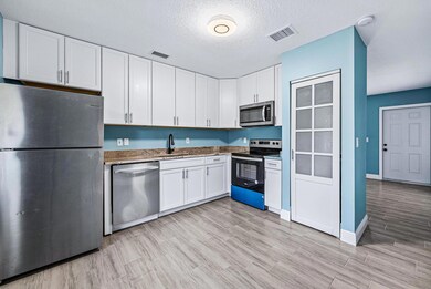 9087 W Highland Pines Blvd, Palm Beach Gardens, FL 33418 - photo 2