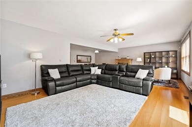 The living room is light and bright! A gas firepla