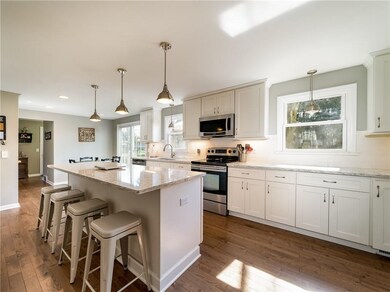 Stunning 50K kitchen with huge island and quartz c