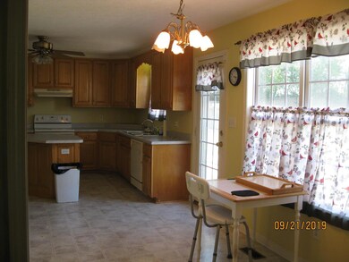 Dining area in kitchen; Laundry room is adjacent to kitchen