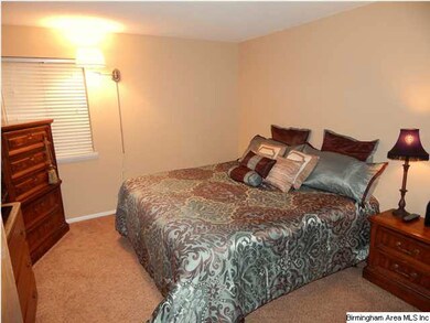 The master bedroom very easily holds a king sized 
