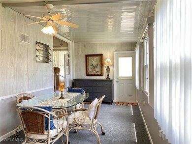 Dining area with ceiling fan