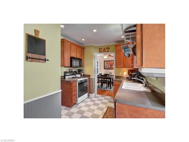 Updated kitchen includes all appliances.
