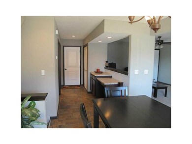 Hallway. laundry, half bath, closet, desk
