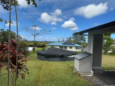 Back bedroom has distant ocean views on a clear da