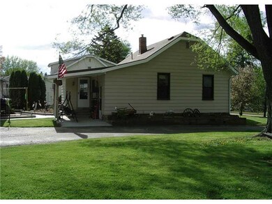 Exterior Back. Covered patio.