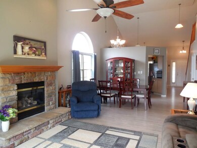 Great room opens to large dining room area next to
