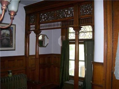 Foyer This intimate alcove features two built in b