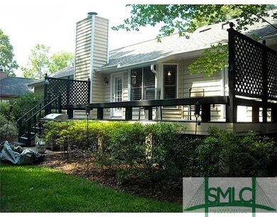 Patio/Deck. Private wood deck and lush lawn