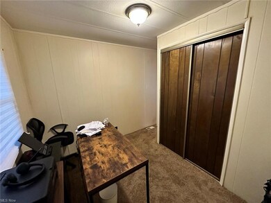 View of carpeted home office