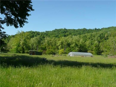 Land. 32 x 16 Equipment Shed or Stable with an ope
