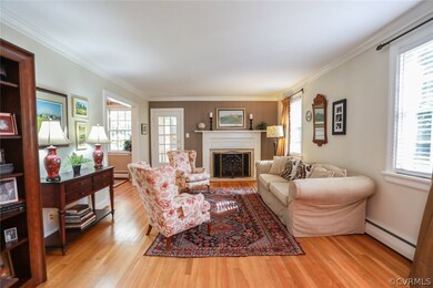 Living Room features a gas log fireplace, is open