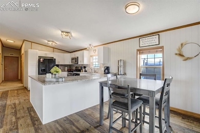 Kitchen featuring appliances with stainless steel 