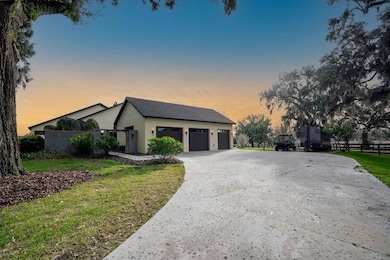 Two and a half car-side-facing garage complemented by a dedicated golf cart bay.
