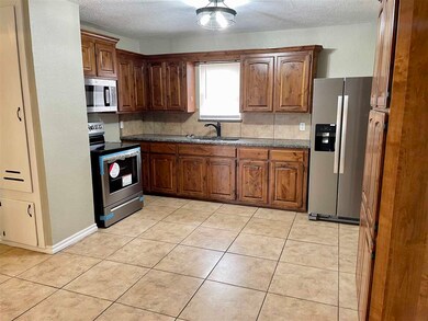 20491 NW Cache Rd, Indiahoma, OK 73552 - photo 4