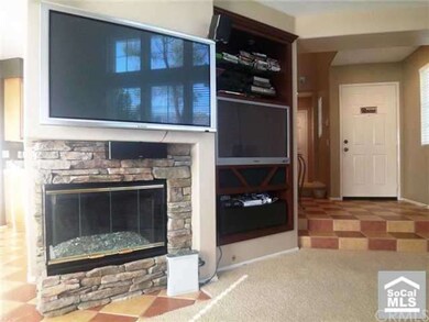 LedgerStone fireplace and built-in media niche