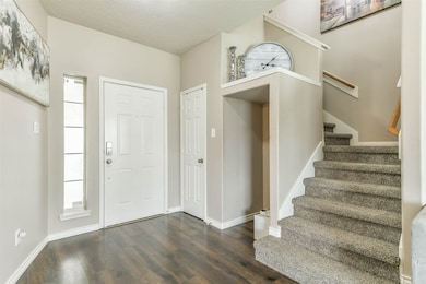 Oversized entry with storage closet and space to a