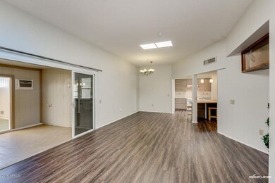 Living to Heated/Cooled AZ Rm