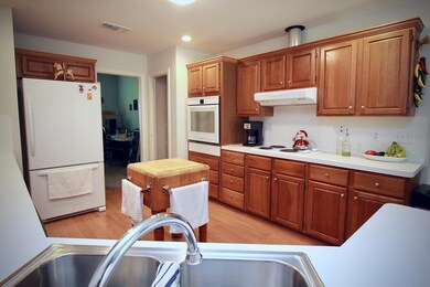 Updated appliances w/ vent hood to attic