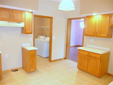Kitchen 1st floor laundry and half bth off kit