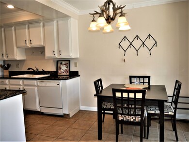 KITCHEN OPEN TO THE DINE AREA