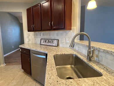 View of your farm sink and the entrance to your formal Diningroom.