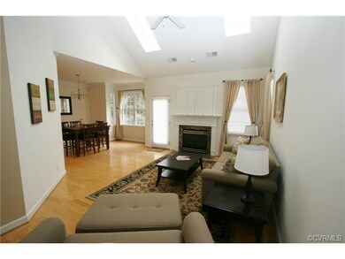 Beautiful great room with skylights and a ceiling 