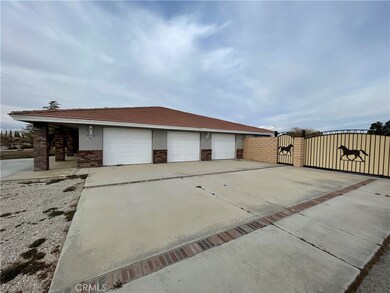 Side house view with garage and RV access gate
