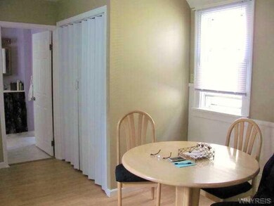Kitchen. Eating area of kitchen, also view of encl