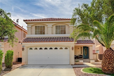 Mediterranean / spanish-style house featuring driv