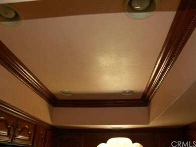 Custom lighting with crown molding.