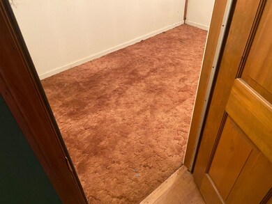 Interior space featuring light carpet