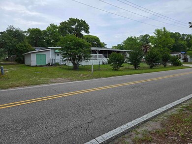 View of front facade featuring a storage unit