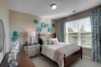 Front bedroom with large window supplying the room with TONS of natural light. *Pictures are of model home, colors and finishes may vary. *