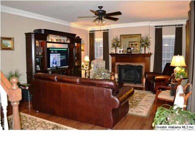 Large living room with 9 ft ceilings, dentil crown