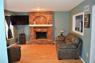 Main floor living space with bay window area.