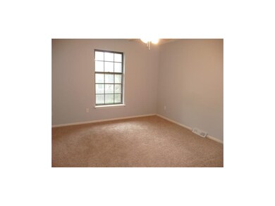 Nice sized bedroom with neutral dcor and good ligh