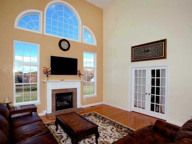 Family Room. TWO STORY FAMILY ROOM WITH LOTS OF WI