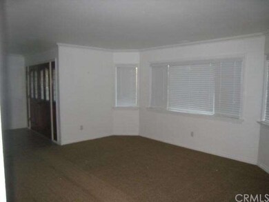FORMAL LIVING ROOM WITH BAY WINDOW