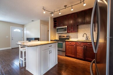 Kitchen towards main living area. 30-year warranty