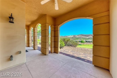 View of patio with a mountain view